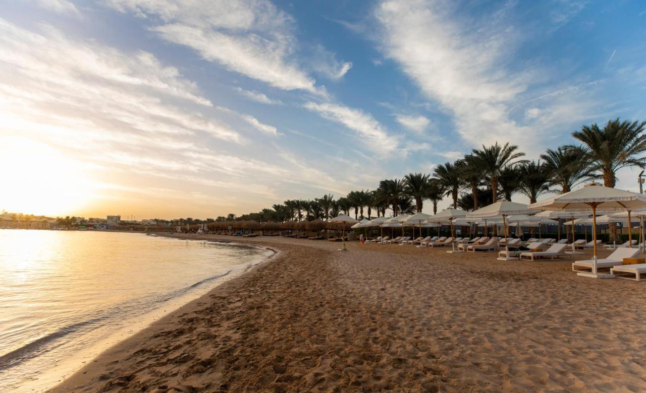 Sunrise Tucana Resort Grand Select Хургада Екстер'єр фото Sunset at the beach of the Hilton Sharm El Sheikh Resort
