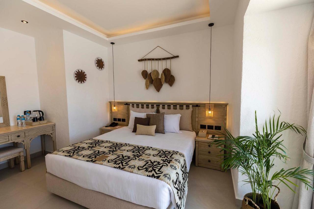 Sunrise Tucana Resort Grand Select Хургада Екстер'єр фото A bedroom at the hotel